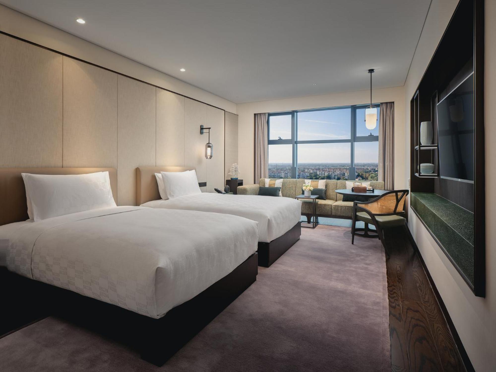 Hualuxe Kunshan Huaqiao By Ihg - F1 Racing Preferred Hotel Exterior foto